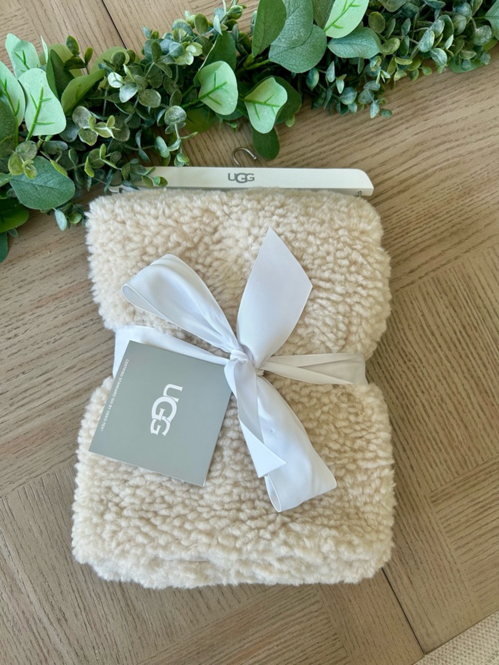 UGG Cozy Sherpa Throw Blanket in Cream with White Bow